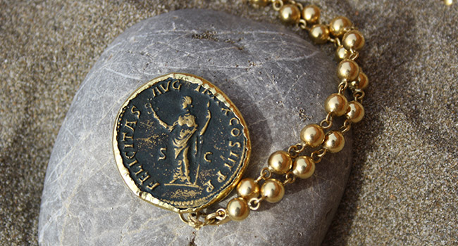 bronze coin Marcus Aurelius with 18k gold